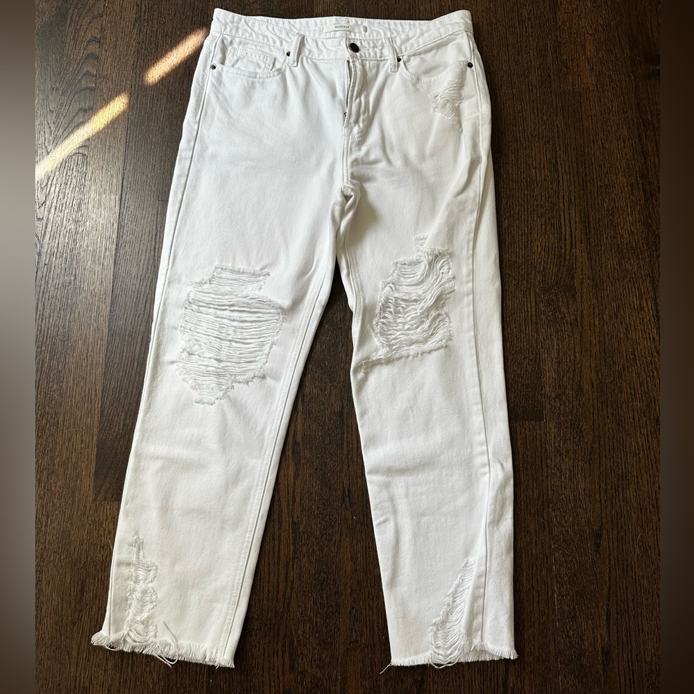 Hidden white denim with distress.